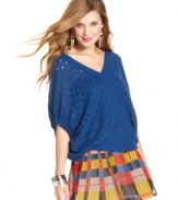 Open-knit design and a chic, slouchy fit add awesome detail to this dolman sleeve sweater from Jessica Simpson.