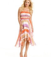 Asymmetrical design meets gorgeous print on this floaty, chiffon party dress from GUESS?.