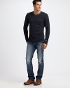 Easy slim-straight fit denim with generous fading for a well-worn feel.Five-pocket styleZip flyInseam, about 34CottonMachine washImported