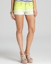 Update your denim wardrobe with these Juicy Couture shorts that flaunt on-trend dip dye in a highlighter hue. Add a neon tee and take the look day to night.