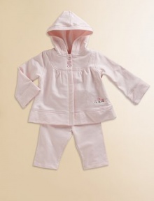 Made from comfortable French terry, this two-piece set charms with a hooded, A-line top and easy pull-ons. Three-button front Floral embroidery on top Elasticized pant Cotton; machine wash Imported