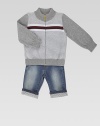 Cozy, classic full zip knit with stripes, signature web and ribbed details. Ribbed stand collarLong sleevesFull front zipperRibbed cuffs and waistbandCottonHand washMade in Italy