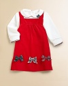 Soft, cozy corduroy adorned with pretty plaid bows in differing tartans.Square necklineYoke front with soft pleatingA-line shapeBack button strapsPlaid bows at hemFully linedCottonMachine washImported
