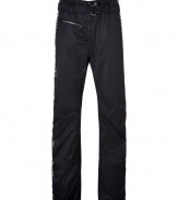 Stay stylish from the lodge to the slopes in these ultra-luxe ski pants from Jet Set - Zip fly, zippered slit pocket, adjustable belt with higher waistline, zippered ankles, star and stripe printed sides, elasticized band at the ankle with silicon for hold - Straight leg - Style with a cashmere pullover, weather boots, and a sleek parka