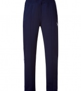 Inject sporty style into your casual look with these fleece pants from Polo Ralph Lauren - Elasticized waistband, side stripe at legs, logo detail at hip - Style with a tee, matching pants, and retro-inspired trainers