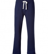 Sporty separates are casual wardrobe essentials, and these Polo Ralph Lauren navy cotton fleece pants have enduring appeal - Classic, straight leg cut - Hidden drawstring tie waist and slash pockets at sides - Embroidered polo pony logo at thigh - Easy and indispensable, perfect for pairing with t-shirts, pullovers and coordinating hoodies