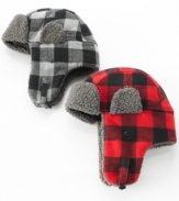 Top off your seasonal style with this plaid trapper hat from American Rag.