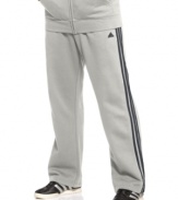 Warm up with these classic, yet soft as a feather, fleece pants from adidas.