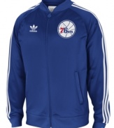 Get in the game. This retro-style Philadelphia 76ers track jacket from adidas is the ultimate fan gear.