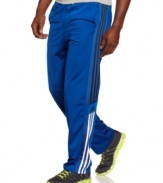 Look good on and off the court wearing these basketball pants by adidas.