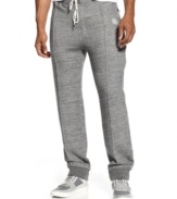 Pull yourself together. Keep it stylish even when you're working out with these track pants from Sean John.