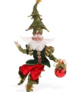 Like an extension of your tree, this well-ornamented fairy wears red, green and gold, plus a fabulous fir hat. Adjust his arms and legs to sit, stand or curl up on display with the whimsical style of Mark Roberts.