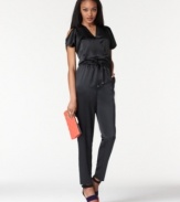 In sleek satin, this Rachel Rachel Roy jumpsuit is oh-so chic for a night on the town! Pair it with statement stilettos to complete the look!