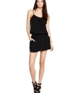 Ruffle trim and a back cutout add eye-catching appeal to this RACHEL Rachel Roy romper -- perfect for a flirty, feminine look!