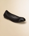 Dual suede and patent leather fabrics and a ruffle detail add chic style to this classic silhouette. Slip-on style Suede and patent leather upper Rubber sole Padded insole Pigskin lining Imported
