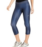 Reach the summit of style in these sleek striped capris from Nike! Its Dri-FIT technology will keep you cool and comfy during long hikes or tough workouts.