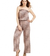 Take a walk on the wild side with Sunny Leigh's animal-print jumpsuit. A softly draped strapless silhouette and flowing wide legs define it as a trendy choice for your next night out.