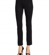 THE LOOKBanded waistSeam accentsSlim fitSide zip closureTHE FITRise, about 8Inseam, about 27THE MATERIALRayon/nylon/other fibersCARE & ORIGINDry cleanMade in ItalyModel shown is 5'10 (177cm) wearing US size 4. 