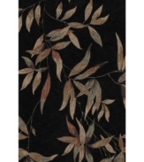Add subtle drama to your living space with the beautifully luxe look of Dalyn's Studio rug. A lush, leafy motif adorns the deep black rug, while hand-tufting lends incredibly plush texture. Durable weave is perfect for high-traffic areas.