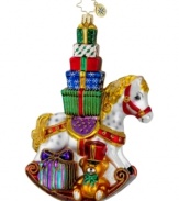 Have a rockin' good time. Stacked with fun surprises, the Wrappin' Rocker ornament by Christopher Radko gets the holiday rolling with festive color and shine.