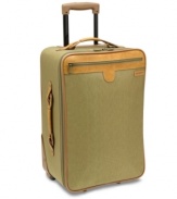 A world traveler. Expanding for more space, this charming suitcase packs in the features that jet-setters demand, such as two separate packing areas, restraining straps to secure garments and a removable hanging travel kit that features a waterseal pocket, elastic storage area and mesh pocket for all of your toiletries. The antique brass hardware and Hartmann's signature trim add a sophisticated look to your travel style. Lifetime warranty. Qualifies for Rebate