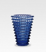This dynamic vase is handcrafted in France with a myriad of facets to catch the light of a candle, lamp or sun. From the Eye Collection5¾ highHand washMade in France