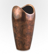 The rounded shape of this handcrafted vase has classic appeal whether you're given to a single bud, a well-edited bouquet or a wild bunch of flowers. And its bronze-finish alloy is a refreshing change from more traditional glass silhouettes. From the Heritage Pebble CollectionAntique copper-plated alloy8H X 4¼ diam.Wipe cleanImported