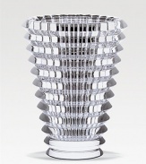 A multi-faceted vase is beautifully handcrafted in France with dynamic texture that captures and accentuates the light in any room. From the Eye Collection Full-lead crystal 5¾ high Hand wash Made in France 