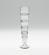 Expertly-crafted with a raised spiral design and an uncanny resemblance to a champagne flute. Mouthblown glass 15 high 38-ounce capacity Handmade Imported