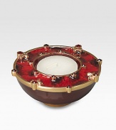Handplaced Swarovski crystal lend added twinkle to a beautifully crafted tealight holder in matte antiqued goldplated pewter. 4½H X 4 diam.Handcrafted in USA