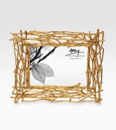A carefully crafted frame takes its inspiration from the intricacies of form and texture found in foliage from around the world in cast metal. From the Bark & Branch CollectionFits a 5 X 7 photograph Overall, 11 X 9Goldplated metalImported