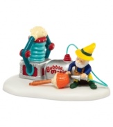 An employee of Pip & Pop's Bubble Works, this handy elf switches on the Bubble Matic and gets to work filling lights. A whimsical figurine from North Pole Village, also by Department 56.