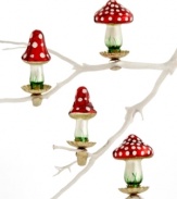 Cap off every branch with a clip-on mushroom ornament from Martha Stewart Collection. Featuring red, white and green accents on molded glass.