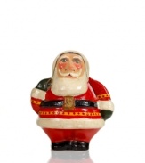 Dressed to impress, chubby Santa Claus embodies the spirit of the holiday season. With his traditional red coat and belt, embellished with an S belt buckle, this figurine is handcrafted from Vaillancourt.