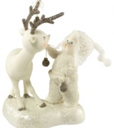 Crafted of pure porcelain bisque, this treasured figurine showcases a sweet Snowbaby and friendly fawn both with rosy cheeks and sparkling silver accents sure to bring a new holiday tradition to your home. From Department 56.