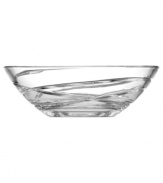 A fanciful cut pattern contrasts the timeless form of this Adorn crystal bowl, featuring the exquisite craftsmanship of Lenox.