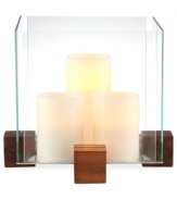 Sheer brilliance. Three candles contained within a block of glass and raised on blocks of wood add modern intrigue to your patio or picnic table. From Dansk.
