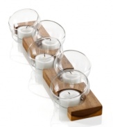 All in line. These Design with Light candle holders from Dansk are a playful alternative to plain tea lights, combining five glass bubbles and rich acacia wood.