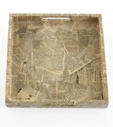 Newsflash: shredded bits of French newspaper make every Heart of Haiti tray truly one of a kind, but each tell the story of Haiti's dedicated artisans. Use for serving drinks, organizing cosmetics or corralling magazines.