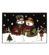 Put a romantic winter stroll on your holiday to-do list. Shaw's holiday rug adds a fun touch to your decor with two love-struck snowpeople sharing a starlight stroll. Constructed of recyclable nylon, this rug adds a wonderful look to any room without the extra impact on mother nature.