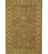 Embrace the antique beauty and the earthy elegance of this exquisite area rug from Safavieh. Tufted in India from pure wool, this rug emerges from the annals of antiquity to bring spectacular style and time-honored quality to your home. (Clearance)