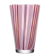 With a retro feel and stripes of pretty purple hues, the beach-inspired Cabana vase brightens any space with irresistible style. Designed by Ludvig Lofgren for Kosta Boda.