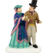 A debonair aristocrat and charming lady walk the streets in Victorian-era England. Crafted of hand-painted porcelain and part of the Dickens' Village collection from Department 56.