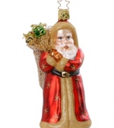 Special delivery! This Inge-Glas ornament features Santa with a sack full of gifts on his back. Mouth-blown and hand-painted for expert craftsmanship.