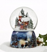 Set to the tune of We Wish You a Merry Christmas, this Musical Carolers snow globe beautifully captures the joys of the season as a trio of carolers stand amidst a country house and shimmering snow.
