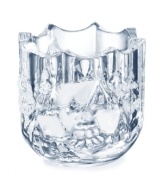 Like a beautiful ice sculpture, this Winter Wonderland votive holder depicts a cozy cottage surrounded by snow-covered trees in twinkling clear glass. A gift to cherish from Celebrations by Mikasa.