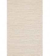 The softest wool and felt fibers are here hand-woven in India to replicate the handsome, rugged look of nautical sweaters in the Spinnaker Knit area rug from Lauren Ralph Lauren. A clean and simple, yet authentic staple made for any modern home.