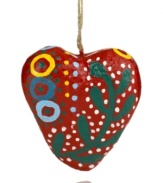 Express your love with an ornament from Heart of Haiti. Handcrafted in a women's co-op using recycled materials and traditional technique, this papier-mache heart is bursting with cheer.