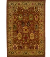 Intricately designed in warm red and gold tones with rich, dark accents, this stately rug adds distinguished decoration to both casual and formal rooms in your home. Soft nylon fabric is cross-woven for exceptional durability.