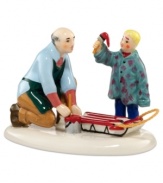 Grandpa repairs all kinds of rides in his Snow Village garage, including his grandson's favorite sled. The red paint flies, from the brush, to his smock and all over his face in this humorous figurine from Department 56.